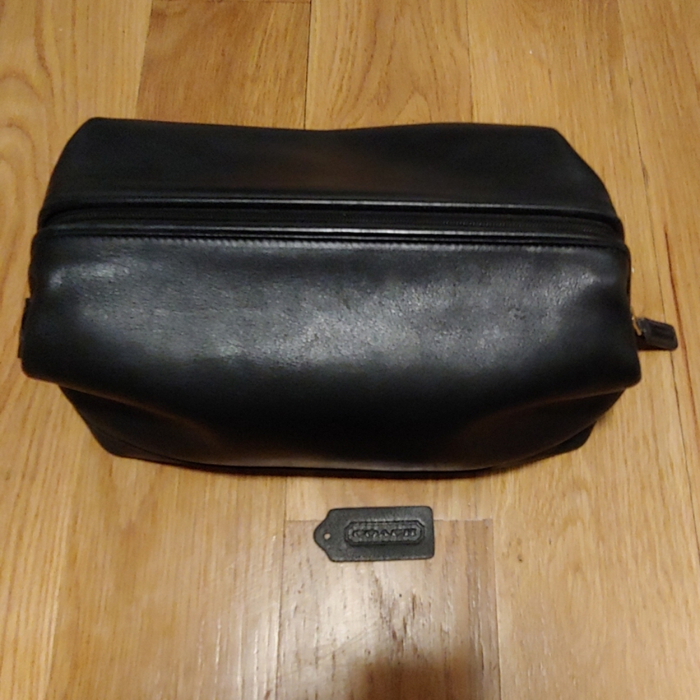 COACH mens black leather toiletries bag.